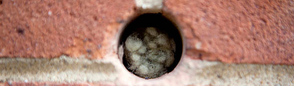 Aislamiento con lana mineral insuflada Aislamiento con lana mineral insuflada